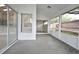 View of screened-in porch showing entry into the home's living spaces at 4404 Gwyndale Ct, Orlando, FL 32837