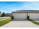 View of the apartment building with the garage at 5089 Caspian St, St Cloud, FL 34771
