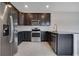 Updated kitchen with stainless steel appliances and granite countertops at 5089 Caspian St, St Cloud, FL 34771