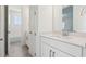 Bathroom features light-colored cabinets and tile flooring at 5260 Citrus Leaf Blvd, Winter Garden, FL 34787