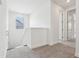 Bright upstairs landing with neutral carpeting and view from the window at 5260 Citrus Leaf Blvd, Winter Garden, FL 34787