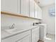 Laundry room with quartz countertops, sink, and washer and dryer at 5260 Citrus Leaf Blvd, Winter Garden, FL 34787