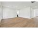 Spacious living room with hardwood floors and ample natural light, ready for personalization at 5260 Citrus Leaf Blvd, Winter Garden, FL 34787