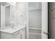 Bright bathroom vanity with quartz countertop, undermount sink, and modern fixtures at 5290 Citrus Leaf Blvd, Winter Garden, FL 34787