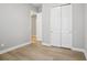 A well-lit bedroom includes a closet and neutral walls, creating a peaceful atmosphere at 5290 Citrus Leaf Blvd, Winter Garden, FL 34787