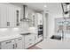 Modern kitchen featuring stainless steel appliances, a stylish backsplash, and ample cabinet space at 5290 Citrus Leaf Blvd, Winter Garden, FL 34787