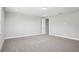 Large bedroom with plush carpet, neutral walls, and recessed lighting at 5307 Citrus Leaf Blvd, Winter Garden, FL 34787
