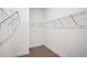Walk-in closet with wire shelving and neutral carpet at 5307 Citrus Leaf Blvd, Winter Garden, FL 34787