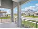 Covered porch view showcasing the street and neighborhood homes at 5307 Citrus Leaf Blvd, Winter Garden, FL 34787