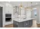 Stylish kitchen with stainless steel appliances, granite counters, and a contemporary design at 5307 Citrus Leaf Blvd, Winter Garden, FL 34787