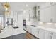 Modern kitchen features stainless steel appliances, stylish fixtures and ample counter space at 5307 Citrus Leaf Blvd, Winter Garden, FL 34787
