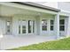Covered patio has a large view of the backyard and several windows at 5307 Citrus Leaf Blvd, Winter Garden, FL 34787