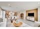 Open-concept living space with a kitchen, dining area, and living room, showcasing a modern and connected design at 545 Moon Shell Cir, New Smyrna Beach, FL 32168