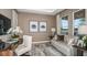 Well-lit study featuring a desk, sitting area, neutral decor, and natural light at 548 Moon Shell Cir, New Smyrna Beach, FL 32168