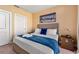 Comfortable bedroom with a queen bed, and modern decor at 7513 Brooklyn Dr, Kissimmee, FL 34747