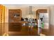 Spacious kitchen with sleek wood cabinetry, modern stainless steel appliances, and ample counter space at 7513 Brooklyn Dr, Kissimmee, FL 34747