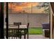Outdoor patio with dining set and comfortable couch; great spot for dining al fresco or relaxing at 7513 Brooklyn Dr, Kissimmee, FL 34747