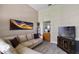 Comfortable living room with large window and neutral color palette at 7672 Torino Ct, Orlando, FL 32835