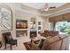 Comfortable living room with fireplace, recessed lighting, and an open layout at 7672 Torino Ct, Orlando, FL 32835