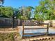 Backyard court area with basketball hoop surrounded by trees at 811 Fairview Ave, Altamonte Springs, FL 32701
