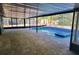Relaxing in-ground pool with screened-in lanai, perfect for outdoor enjoyment at 811 Fairview Ave, Altamonte Springs, FL 32701