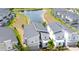 Modern homes with screened-in pools, situated in a community with a picturesque lake at 8912 Cabot Cliffs Dr, Davenport, FL 33896