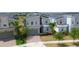 Desirable neighborhood boasts modern homes, lush landscaping, and serene lake views in a convenient location at 8912 Cabot Cliffs Dr, Davenport, FL 33896