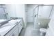 Bright bathroom featuring double vanity and glass shower at 8912 Cabot Cliffs Dr, Davenport, FL 33896