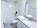 A clean bathroom featuring a white bathtub with a shower at 8912 Cabot Cliffs Dr, Davenport, FL 33896