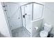 Bright bathroom featuring a glass shower at 8912 Cabot Cliffs Dr, Davenport, FL 33896