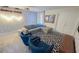 An open, airy bonus room featuring a modern movie screen at 8912 Cabot Cliffs Dr, Davenport, FL 33896