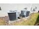 Well-maintained outdoor AC units, ensuring efficient cooling for a comfortable living environment at 8912 Cabot Cliffs Dr, Davenport, FL 33896