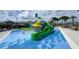 Vibrant community splash pad with colorful features, perfect for Gathering-friendly water activities and enjoyment at 8912 Cabot Cliffs Dr, Davenport, FL 33896