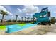 Exciting community waterslide for endless fun and recreation, surrounded by lush landscaping at 8912 Cabot Cliffs Dr, Davenport, FL 33896
