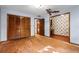 Bedroom with closet and view to office with wallpapered wall at 102 Wild Plum Ln, Longwood, FL 32779