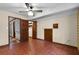 Bedroom featuring a ceiling fan and closet at 102 Wild Plum Ln, Longwood, FL 32779