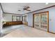 Dining area with large windows and glass doors leading outside at 102 Wild Plum Ln, Longwood, FL 32779