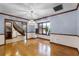 Dining room showcasing hardwood floors, chandelier and large bay window at 102 Wild Plum Ln, Longwood, FL 32779