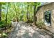 Driveway with mature trees surrounding at 102 Wild Plum Ln, Longwood, FL 32779