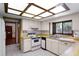 Kitchen featuring classic white appliances and tile floors and countertops at 102 Wild Plum Ln, Longwood, FL 32779