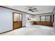 Living room features built-in shelves and bar area, plus an open area to the kitchen at 102 Wild Plum Ln, Longwood, FL 32779