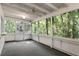 Screened patio with wooded views from all angles at 102 Wild Plum Ln, Longwood, FL 32779