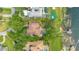 Desirable neighborhood featuring mature landscaping, private pools, and serene waterfront vistas at 10577 Down Lakeview Cir, Windermere, FL 34786