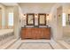 Spacious bathroom featuring a double vanity, soaking tub, and tile shower at 10577 Down Lakeview Cir, Windermere, FL 34786