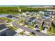 Community aerial view with lakeside properties and well-maintained landscaping at 1134 Pando Loop, Orlando, FL 32824