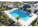 Aerial view of the community pool and lounge area at 1134 Pando Loop, Orlando, FL 32824