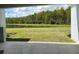 Enjoy the backyard views of the pond and crane from this patio at 1134 Pando Loop, Orlando, FL 32824