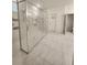 Bathroom featuring large glass shower with dual shower heads and tile flooring at 1134 Pando Loop, Orlando, FL 32824