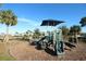 Community playground with slides and plenty of open space for  at 1134 Pando Loop, Orlando, FL 32824