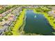 An aerial shot showcasing the neighborhood pond at 11689 Hampstead St, Windermere, FL 34786